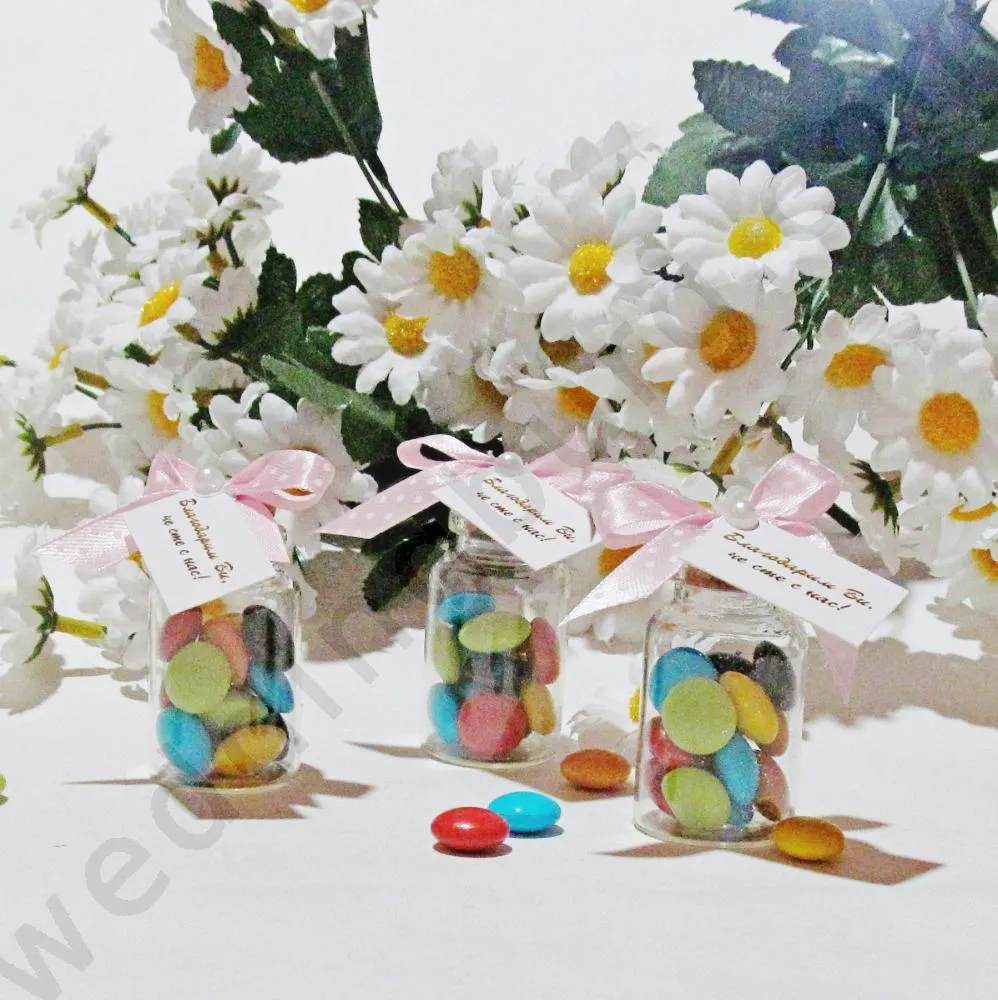 Подаръци за кръщене - Предлагаме шишенца с много сладък дизайн, пълни с цветни бонбони, модел PG162